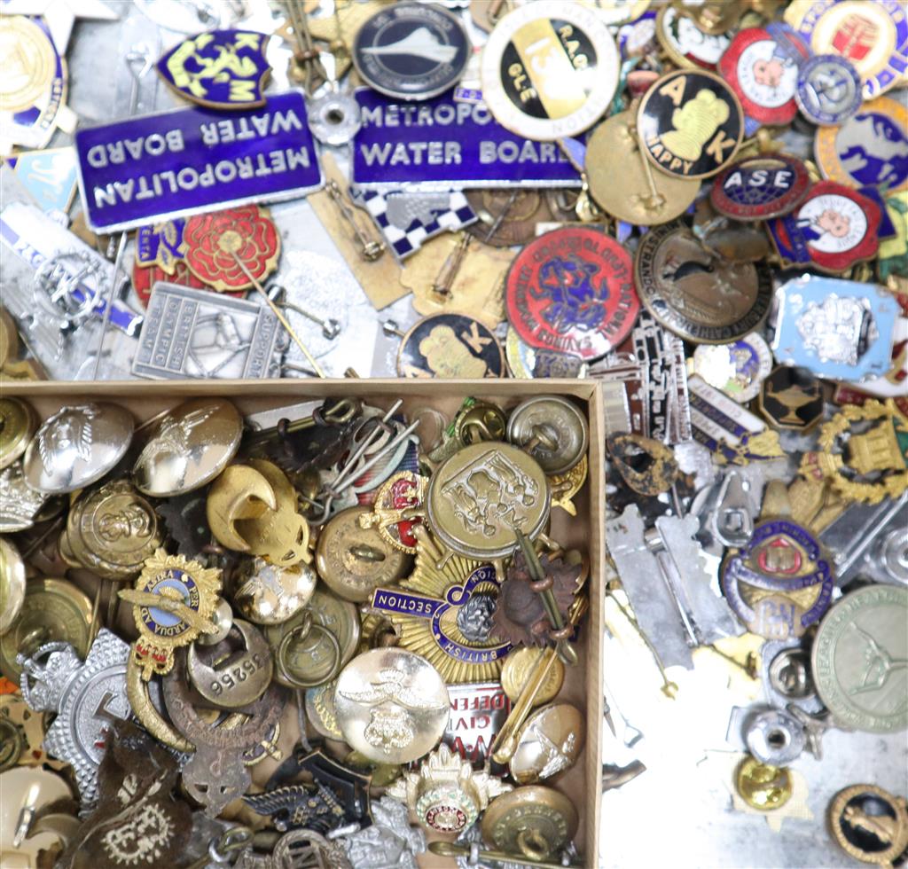 A quantity of badges, including military